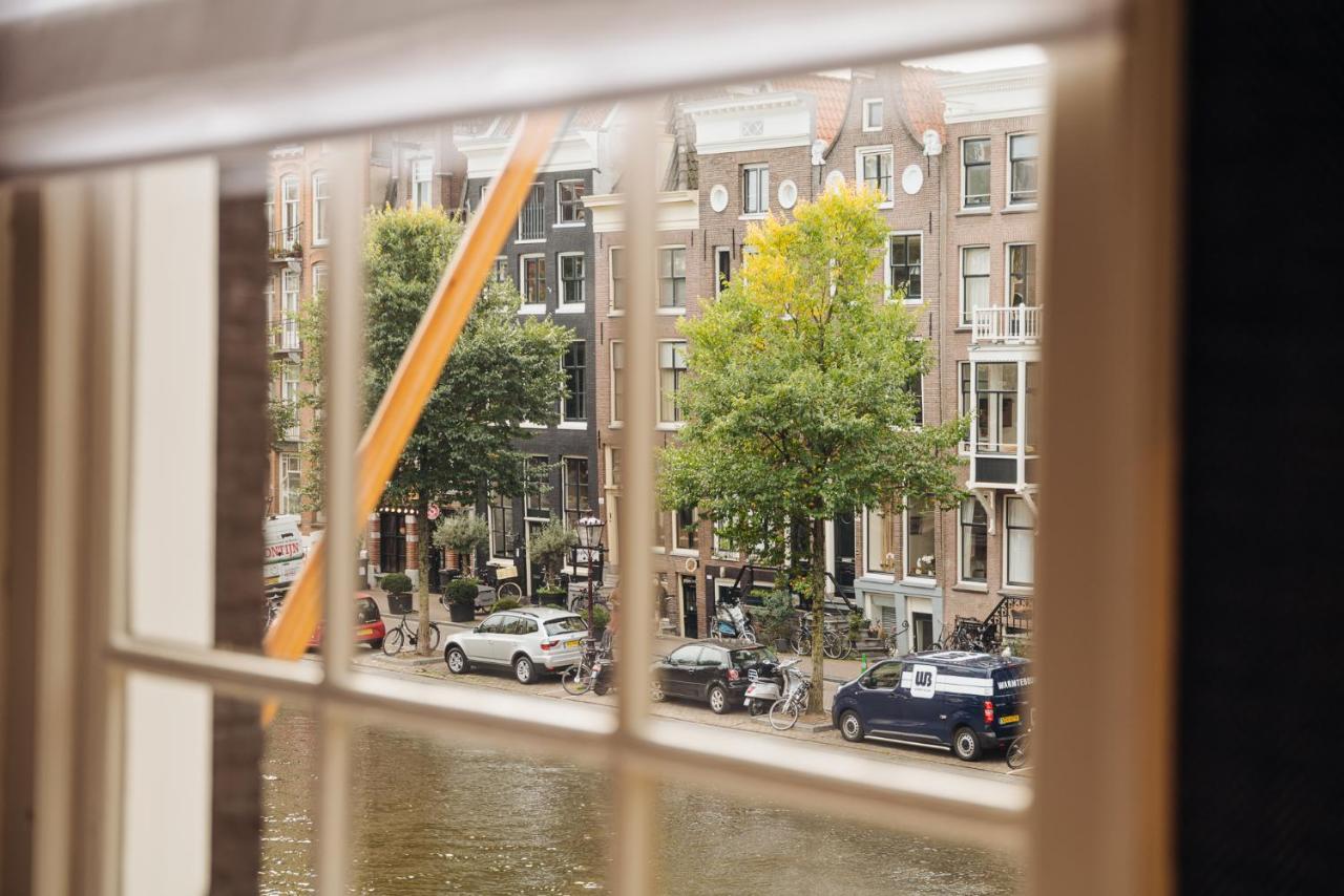 Hotel 717 Amesterdão Exterior foto View from the window of a canal house in Amsterdam